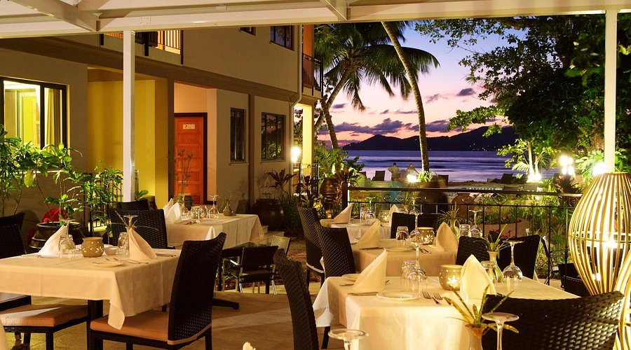 Le Repaire Italian-Creole restaurant with fairy lights at Anse Réunion, La Digue
